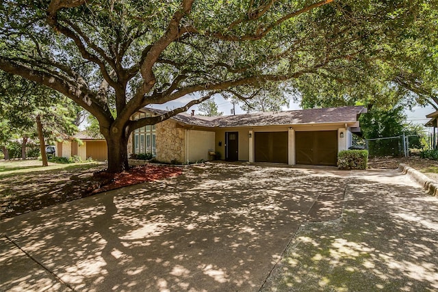 ranch-style home with a garage