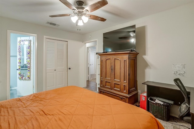 bedroom featuring ceiling fan and a closet