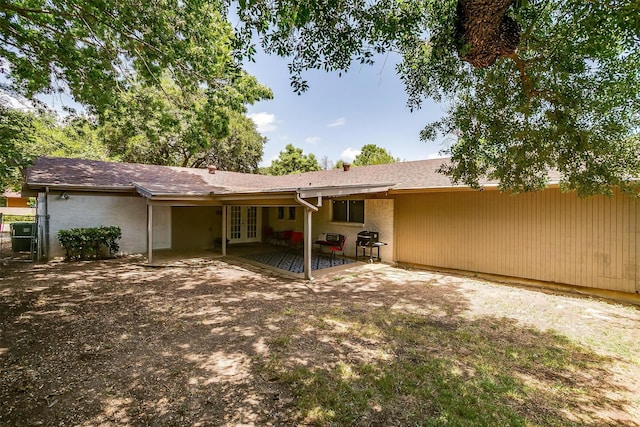 rear view of house with a patio area