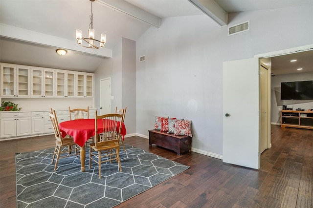 dining room featuring beamed ceiling, high vaulted ceiling, dark hardwood / wood-style floors, and an inviting chandelier