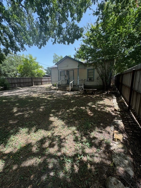 view of yard featuring a wooden deck