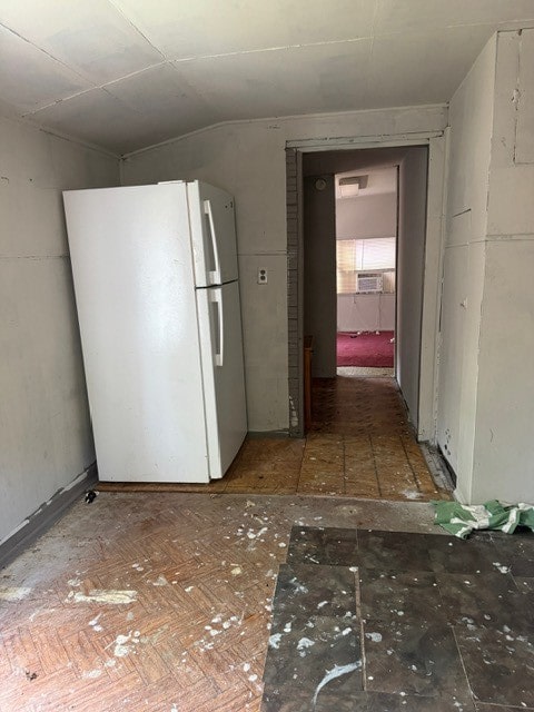 interior space featuring white refrigerator