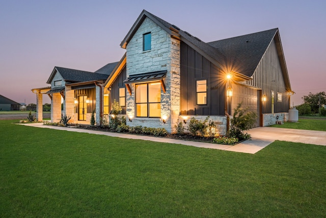 modern farmhouse with a yard