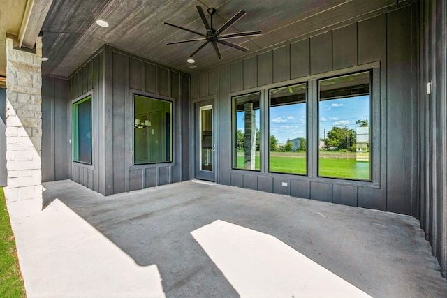 view of patio featuring ceiling fan