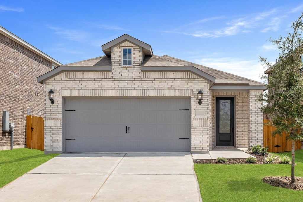 view of front of property with a front lawn