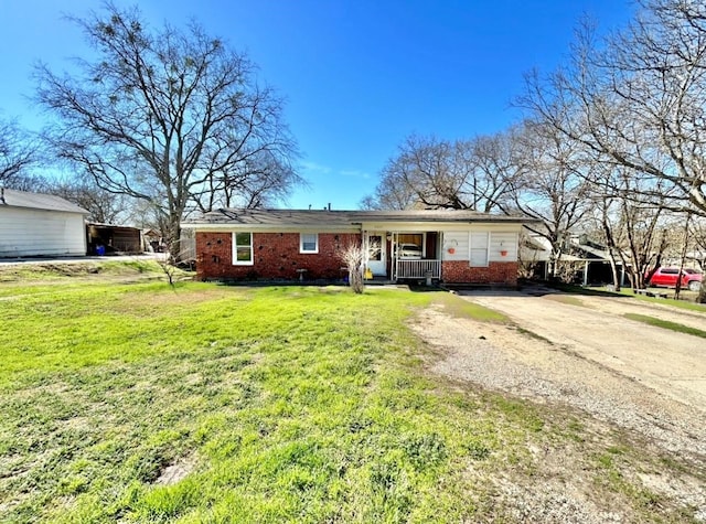 ranch-style house with a front yard