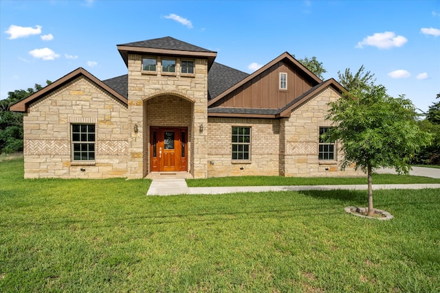 view of front of home with a front yard