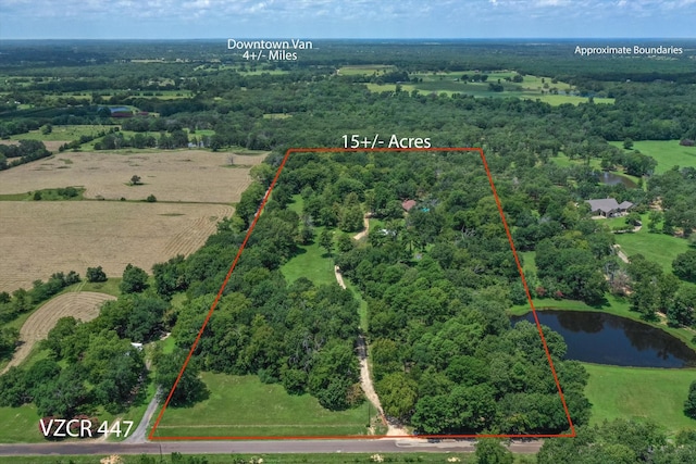 aerial view featuring a water view and a rural view