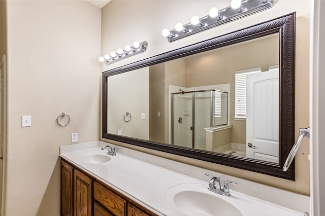 bathroom featuring vanity and walk in shower