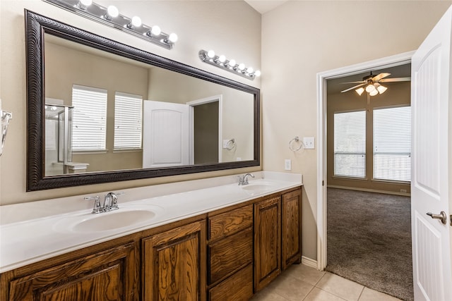 bathroom featuring tile patterned floors, ceiling fan, toilet, and vanity