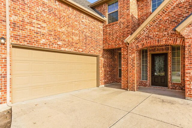 exterior space with a garage