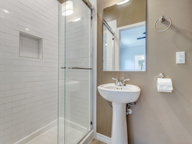 bathroom with an enclosed shower