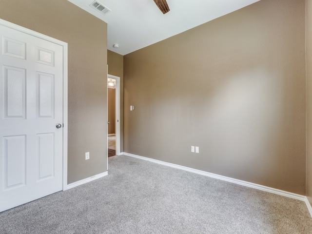 unfurnished bedroom featuring ceiling fan and carpet flooring