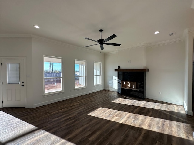 unfurnished living room with ceiling fan, dark hardwood / wood-style floors, and ornamental molding