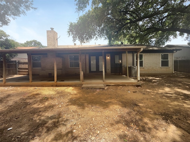 rear view of property with a patio area