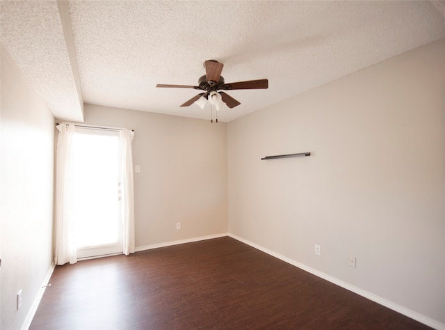 spare room featuring a textured ceiling, ceiling fan, and hardwood / wood-style floors