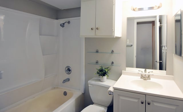 full bathroom with vanity, toilet, and shower / tub combination