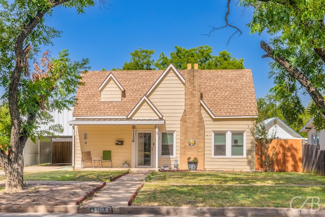 view of front of home with a front lawn