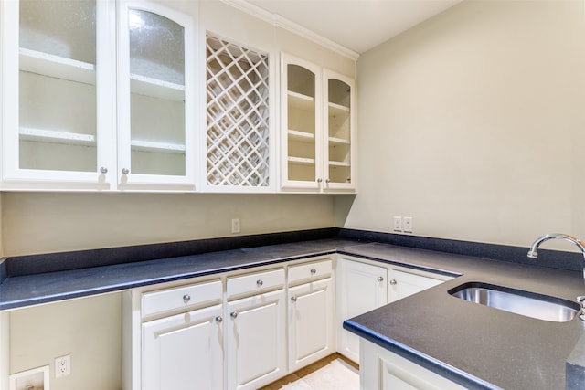 kitchen with sink and white cabinets