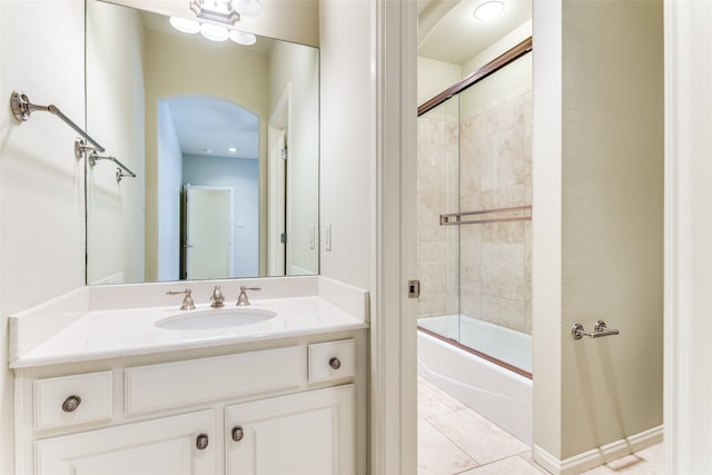 bathroom featuring shower / bath combination with glass door, vanity, and tile patterned floors