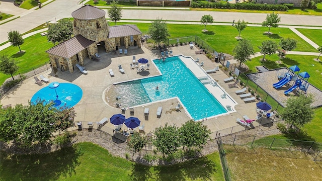 view of swimming pool featuring a patio