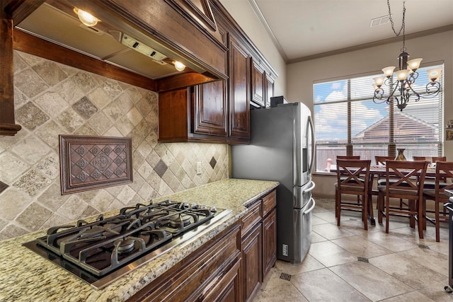 kitchen featuring light tile patterned flooring, light stone counters, stainless steel appliances, and custom range hood