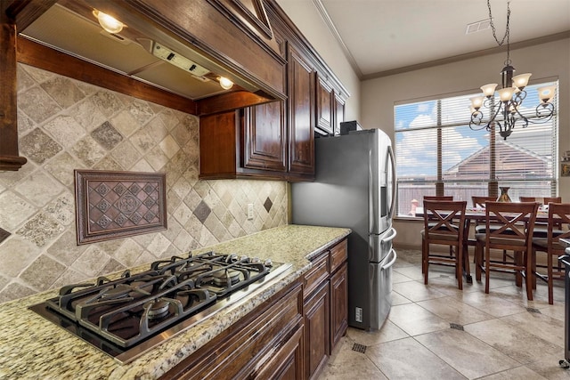 kitchen with stainless steel appliances, light stone countertops, ornamental molding, backsplash, and custom range hood