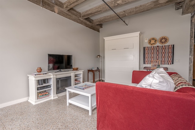 living room with beamed ceiling