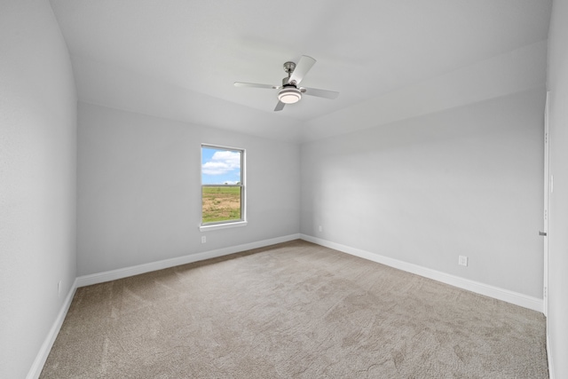 unfurnished room with carpet floors and ceiling fan