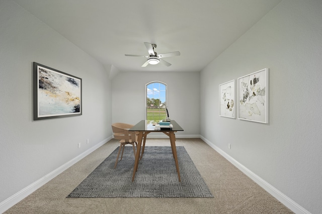 office space with carpet floors and ceiling fan