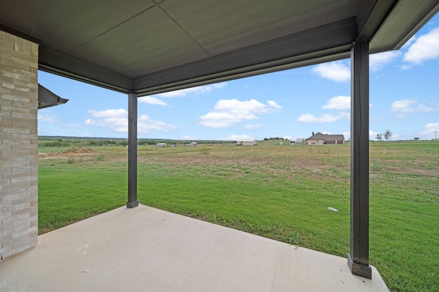 view of patio / terrace featuring a rural view