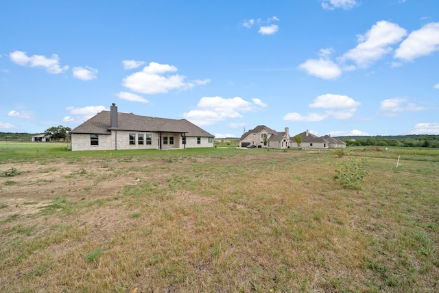 view of yard featuring a rural view