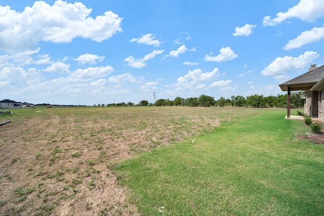 view of yard featuring a rural view