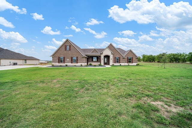 view of front of home with a front yard