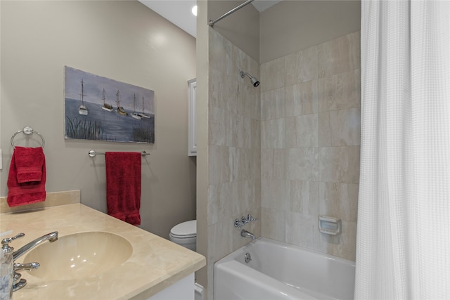 full bathroom featuring shower / bath combo, toilet, and vanity