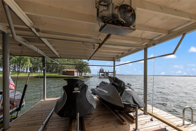 dock area featuring a water view