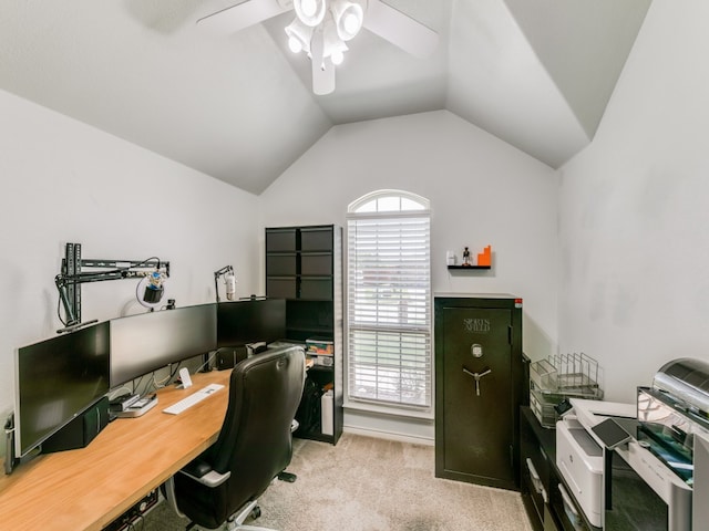 home office featuring light carpet, ceiling fan, and lofted ceiling