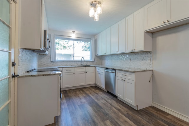 kitchen with white cabinetry, stainless steel appliances, dark hardwood / wood-style flooring, sink, and backsplash