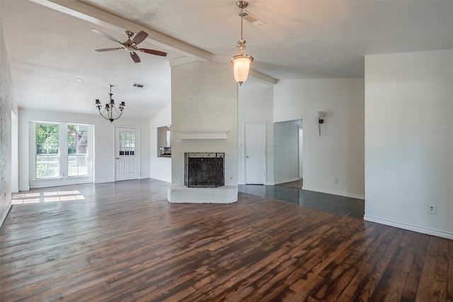 unfurnished living room featuring vaulted ceiling with beams, dark wood-type flooring, a textured ceiling, a fireplace, and ceiling fan