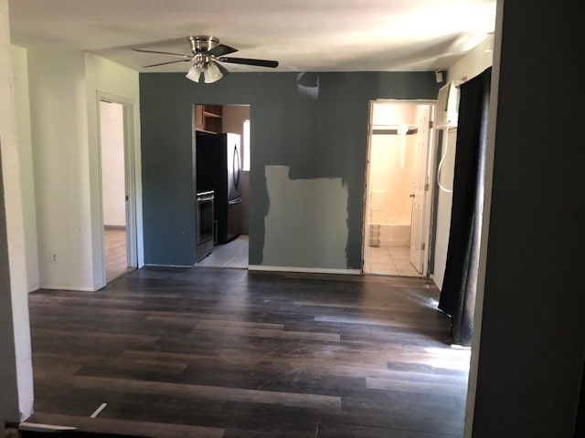 interior space with ceiling fan and hardwood / wood-style floors