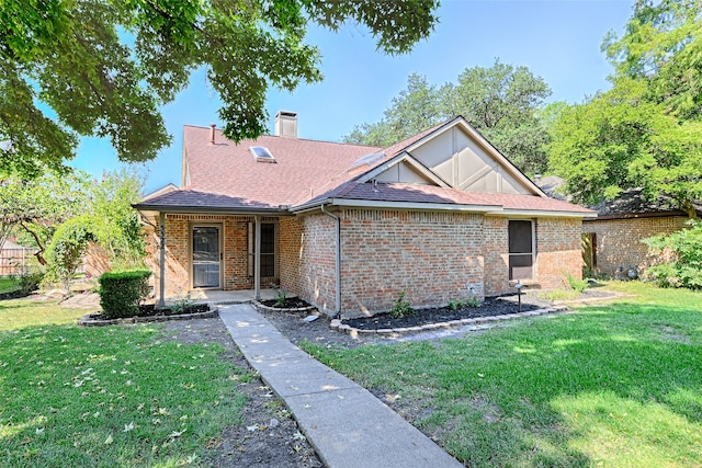 view of front of home with a front yard