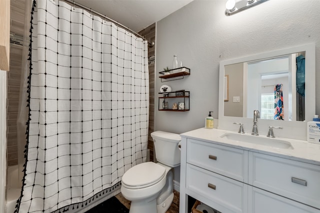 full bathroom featuring vanity, shower / tub combo, and toilet