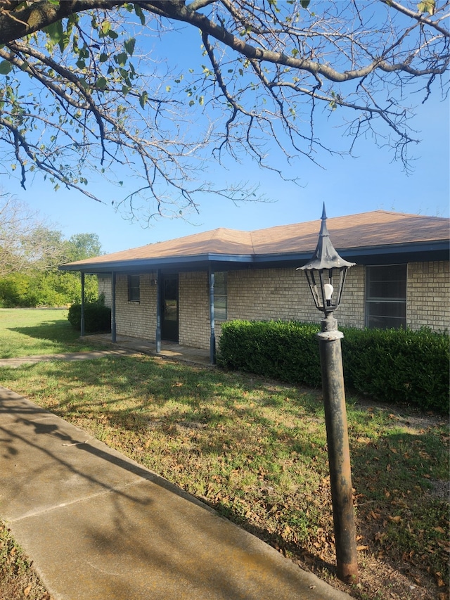 view of front of home with a front yard