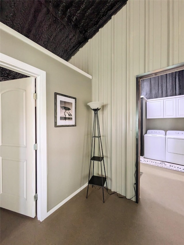 interior space featuring washing machine and clothes dryer