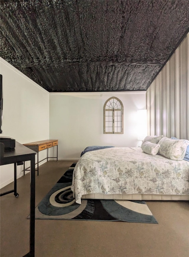 carpeted bedroom featuring crown molding