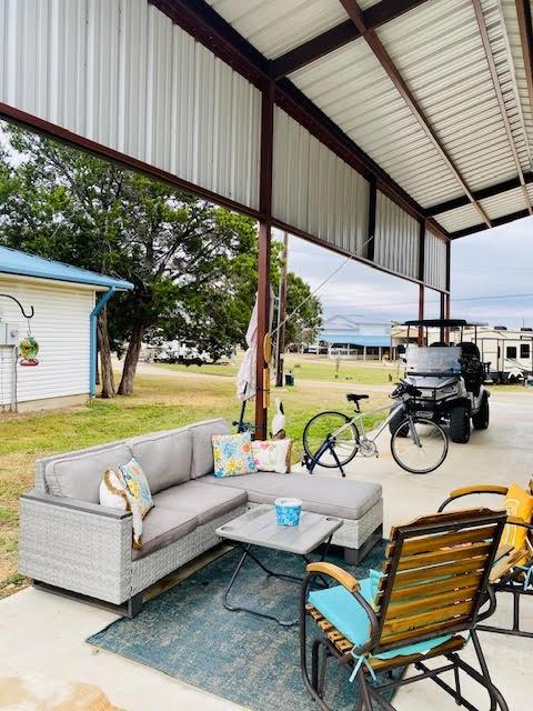 view of patio / terrace with a carport