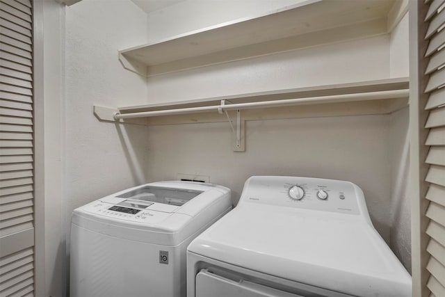 laundry area with washer and clothes dryer