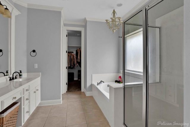 bathroom featuring tile patterned floors, vanity, ornamental molding, and shower with separate bathtub