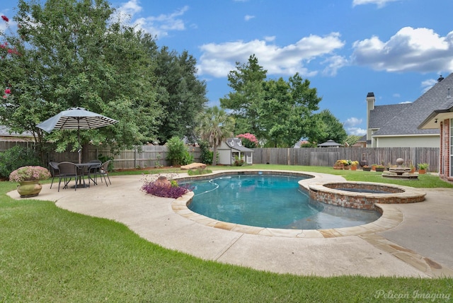 view of pool with an in ground hot tub and a patio