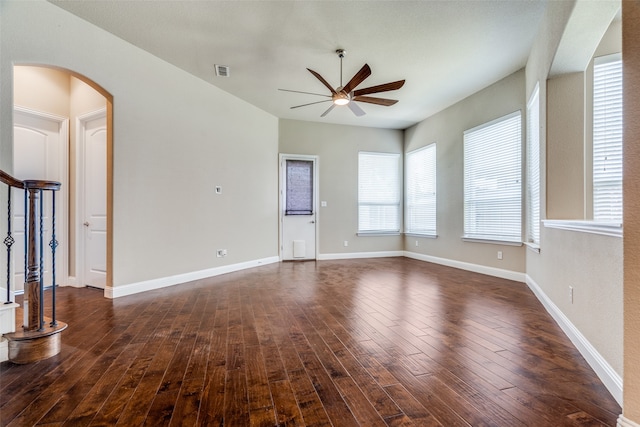 unfurnished room with ceiling fan and hardwood / wood-style flooring